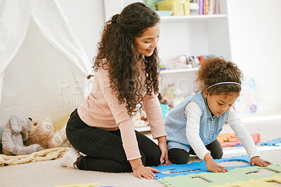 Buy stock photo Mother, girl and toys in home for learning on floor, kindergarten lesson and helping kid. Mom, daughter and creative education for child development, parent support and puzzle for English alphabet