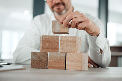Buy stock photo Building blocks, hands and business man in office for future planning, insurance or finance. Wood, puzzle and closeup of male entrepreneur with asset management, investment or financial security 
