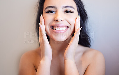 Buy stock photo Woman, portrait and skincare on face in studio with beauty, cosmetics and facial treatment at spa for healthy skin. Smile, hand and product for clean, glow and shine from dermatology in morning