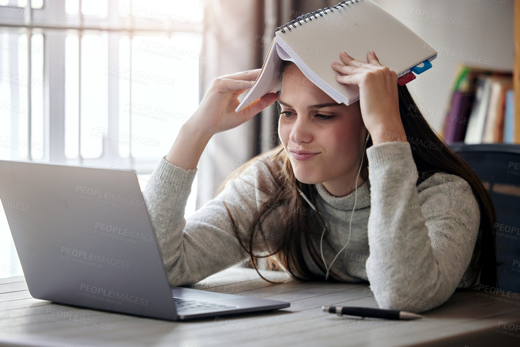 Buy stock photo Laptop, burnout and education with a student woman feeling stress while studying alone in her home. Learning, headache and exhausted with a female university or college pupil in her house to study