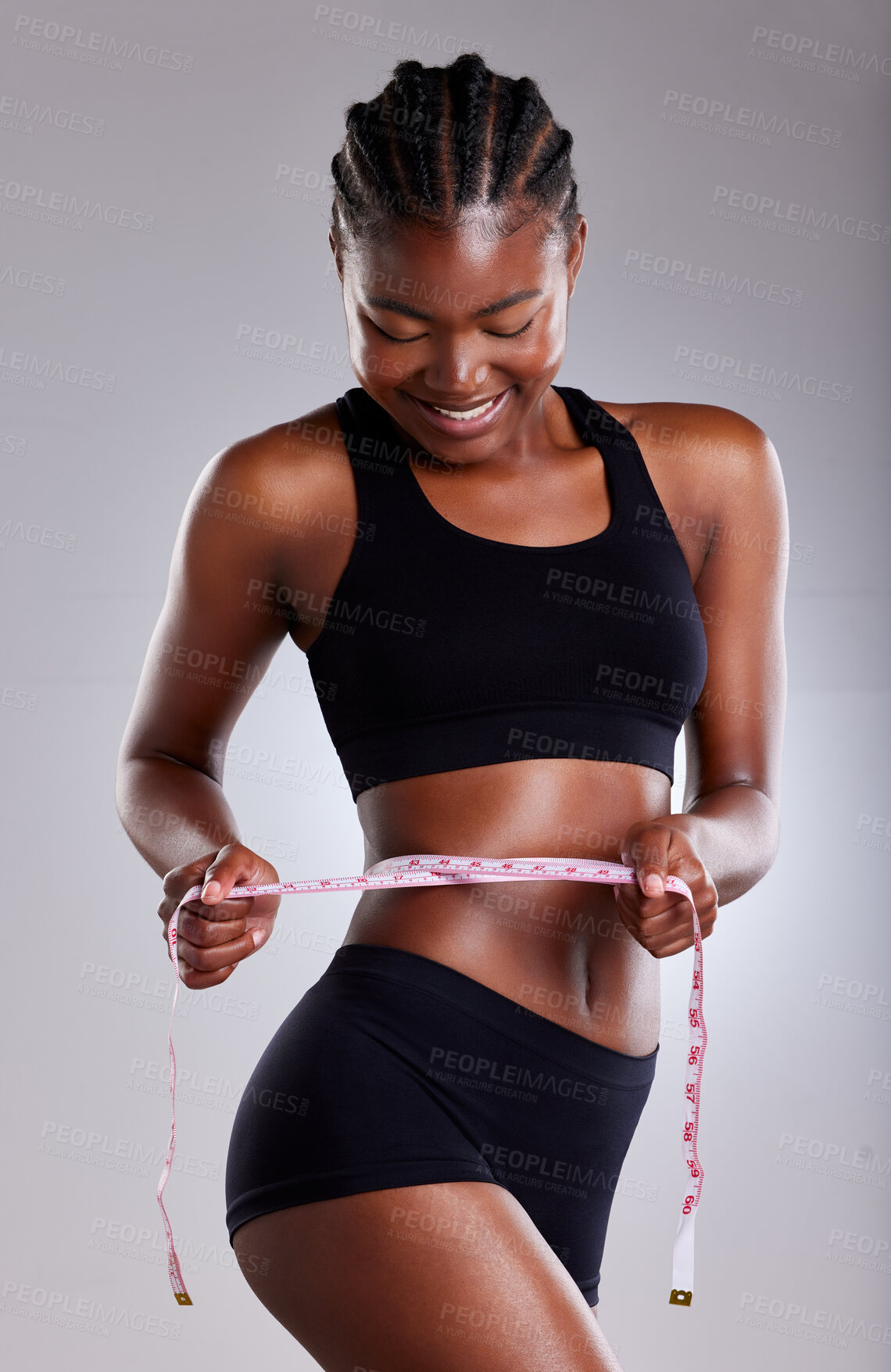 Buy stock photo Studio, fitness and black woman with tape for health, diet and wellness by mockup space. Female model, tracking and measure waist for progress, body goals results and benefits by gray background