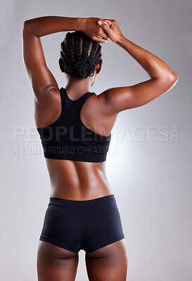 Buy stock photo Muscle, studio and back of person, sportswear and workout for fitness, training and stretching of arms. White background, healthy and exercise for practice, performance and flexing  for sport in gym