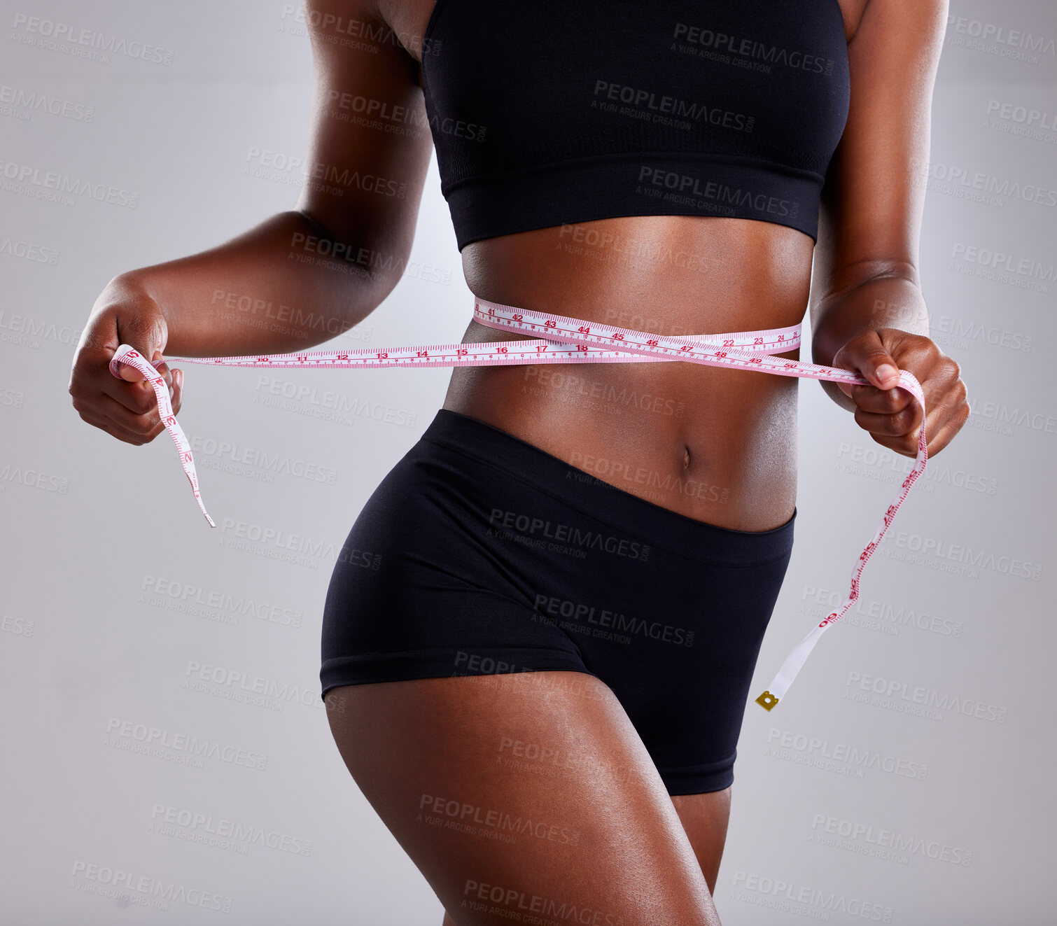 Buy stock photo Studio, fitness and black woman with tape for diet, health and wellness by mockup space. Female model, tracking and measure waist for progress, body goals results and benefits by gray background