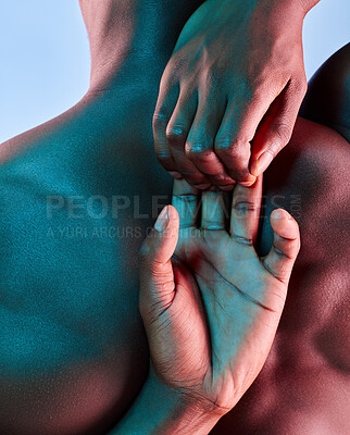 Buy stock photo Shot of a muscular man posing against a studio background