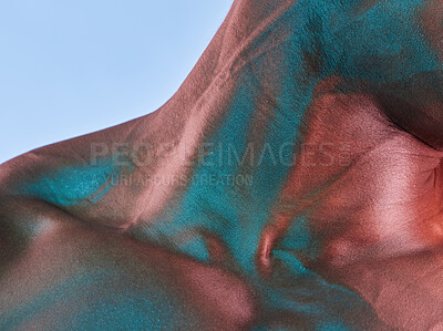 Buy stock photo Shot of a muscular man posing against a studio background