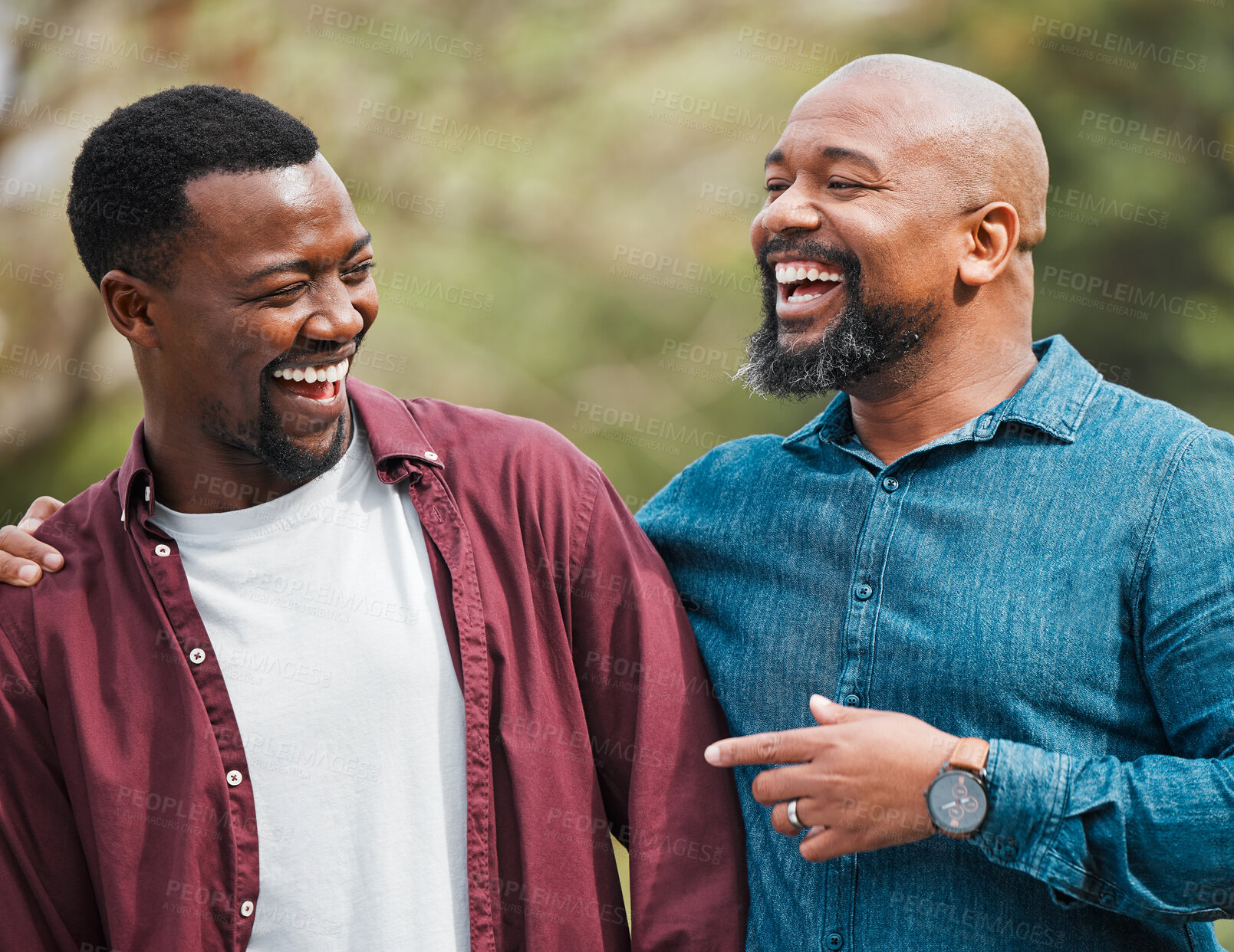 Buy stock photo Black family, dad and outdoor hug with man, humor and together for love in relationship. Happy people, father and son in embrace for support, funny conversation and travel to Nigeria for laughing