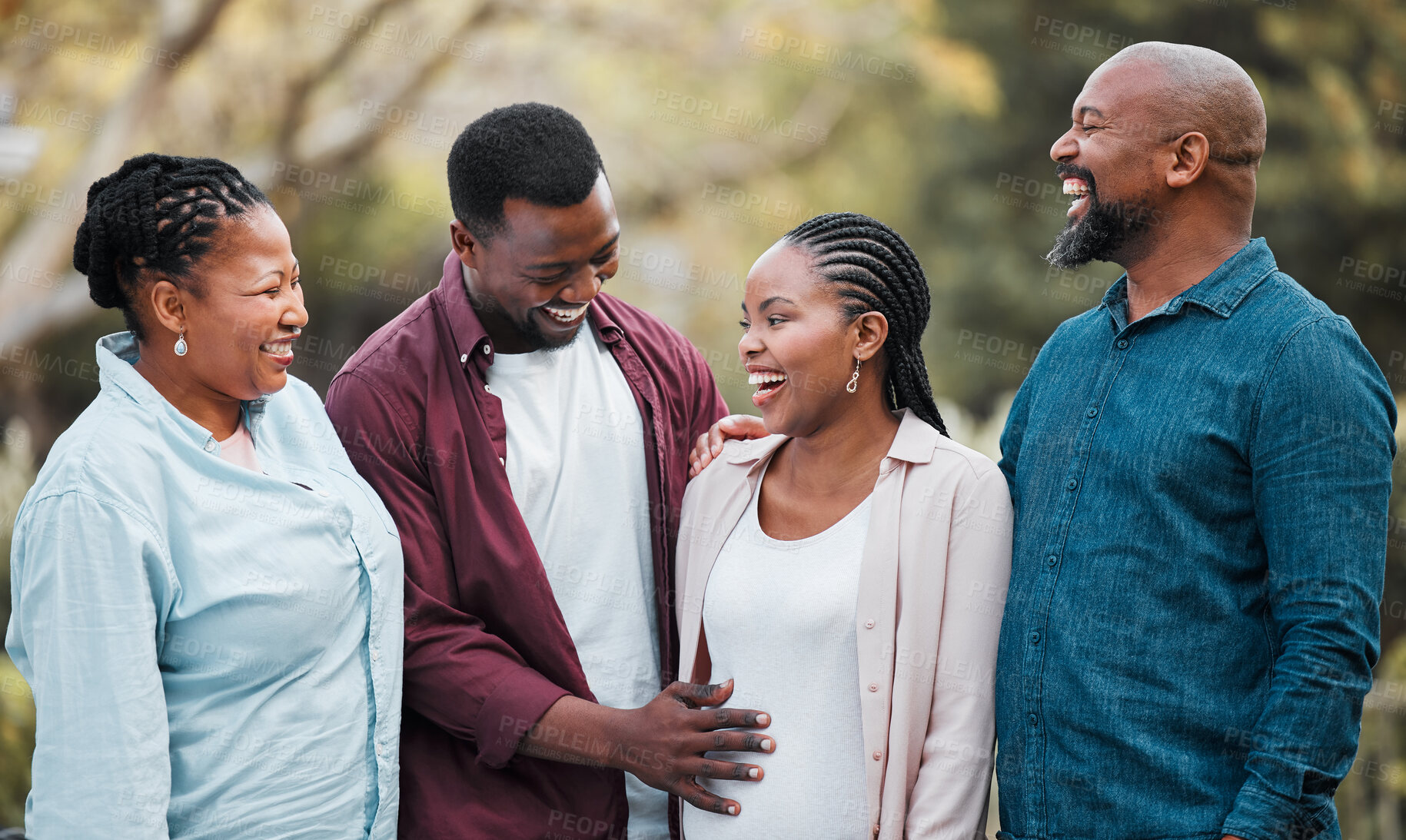 Buy stock photo Woman, pregnancy and happy with black family in nature for security, care and love of future child. Smile, grandparents and man with hand on pregnant belly for maternity, parenthood and support