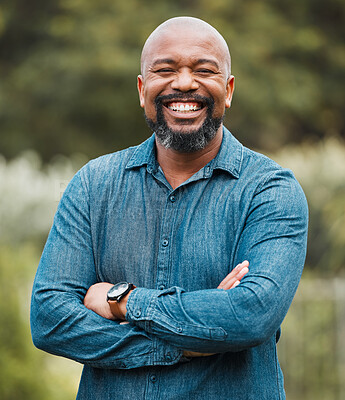 Buy stock photo Black man, portrait and happy in backyard to relax, holiday and sunshine with confidence or pride. Mature person, face and smile in home garden for leisure, vacation and weekend with crossed arms