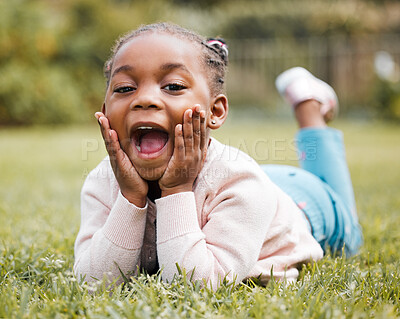 Buy stock photo Shot of a little girl happily spending time alone in her family garden
