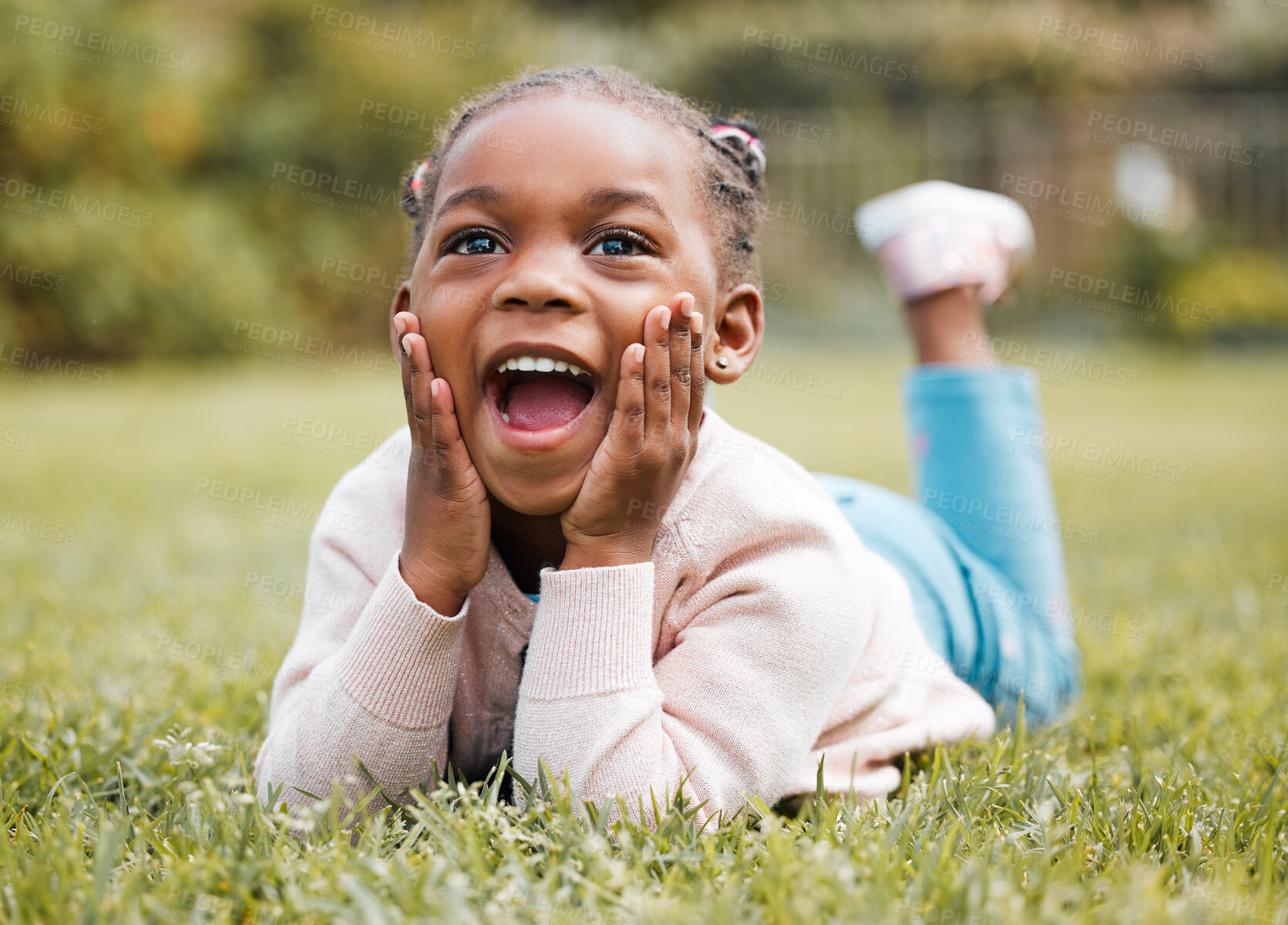 Buy stock photo African girl, child and surprise on grass for thinking, smile and relax on vacation, picnic and outdoor in nature. Kid, happy and excited on lawn in backyard, garden and wow with memory in Kenya