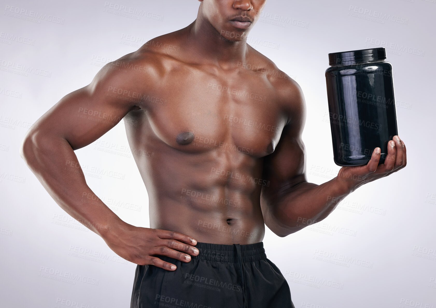Buy stock photo Black man, bodybuilder and jar in studio for protein, powder or supplements for wellness by white background. Person, container and strong with pharma product for healthy body, nutrition and benefits