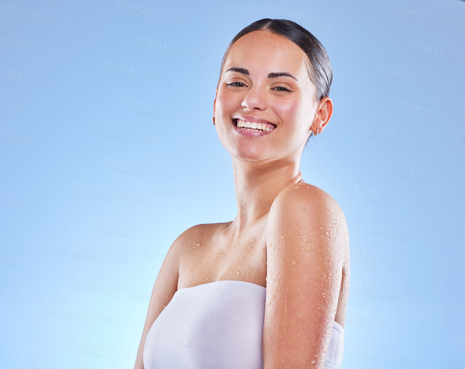 Buy stock photo Beauty, portrait and smile with natural model in studio blue background for satisfaction or wellness. Aesthetic, face and skincare with happy woman in bathroom for cosmetics, dermatology or health