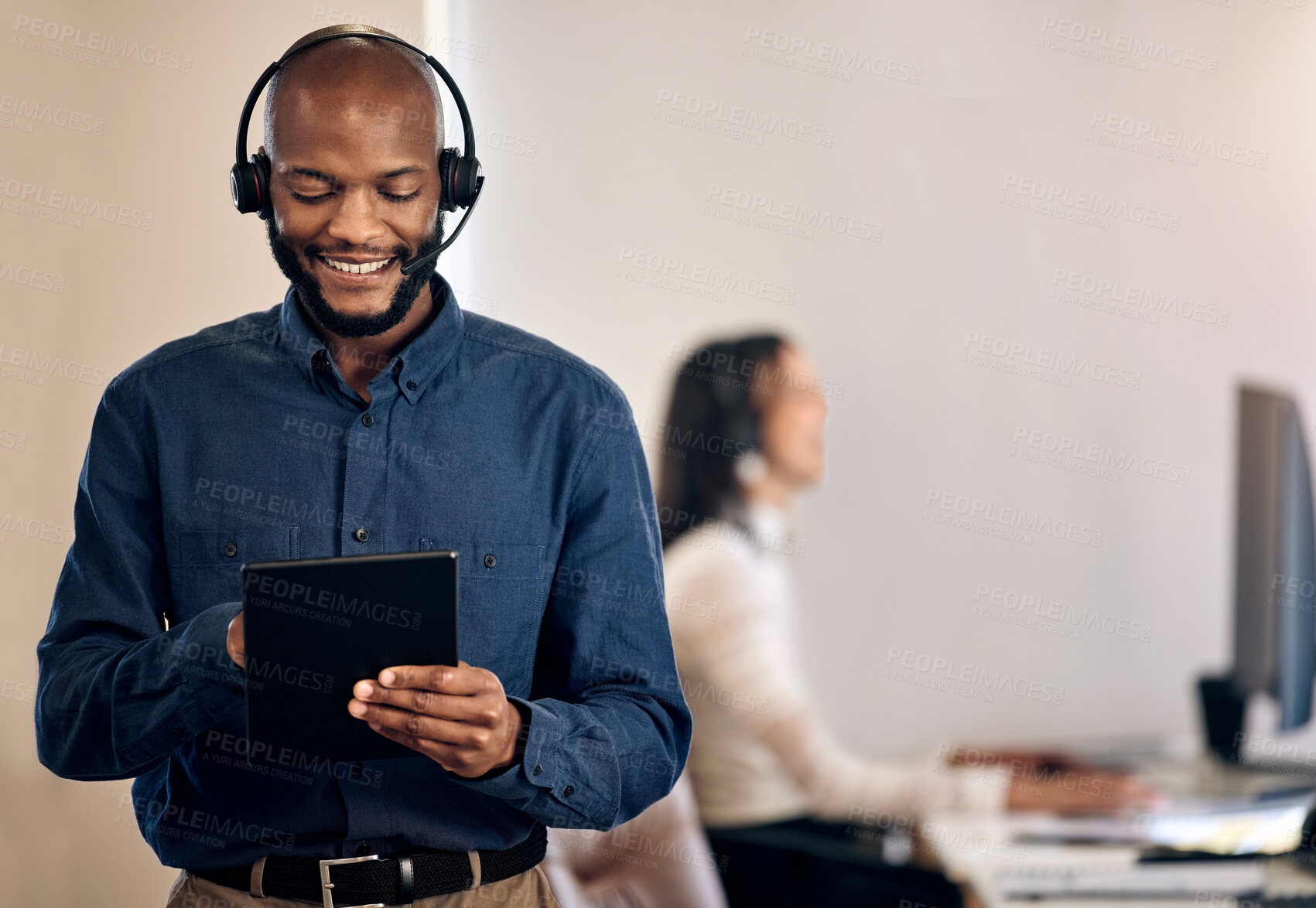 Buy stock photo Call center, tablet and man online for customer service, crm or telemarketing support. Black person, consultant or agent with a smile and technology for online sales, contact us or help desk advice