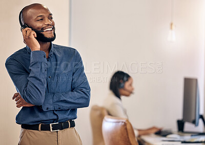 Buy stock photo Call center, laughing and man with headset for customer service, crm or telemarketing support. Black person, consultant or agent talking on microphone for sales, contact us or help desk space