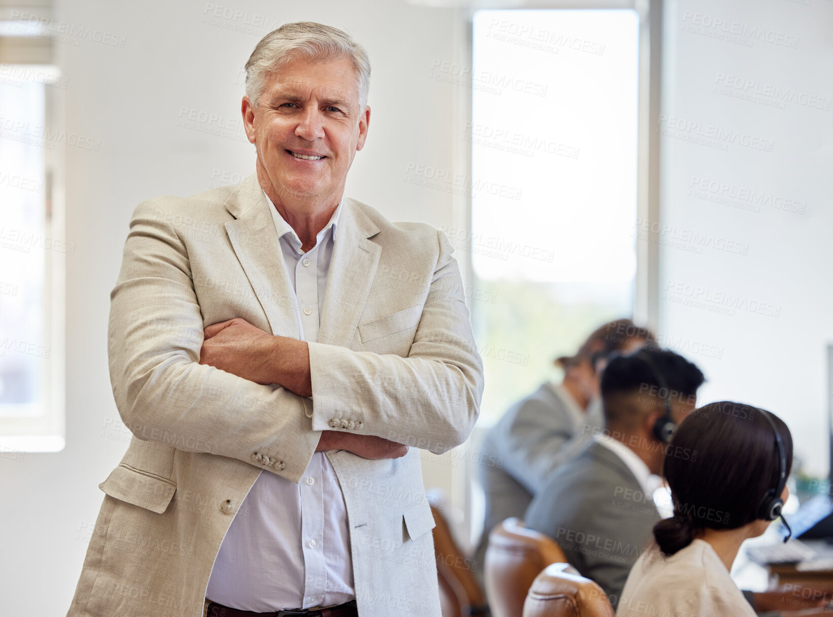 Buy stock photo Arms folded, mature and portrait of businessman and smile in call center for training. Happy, ceo and team in office for seminar, leadership and telemarketing in workplace with pride for company