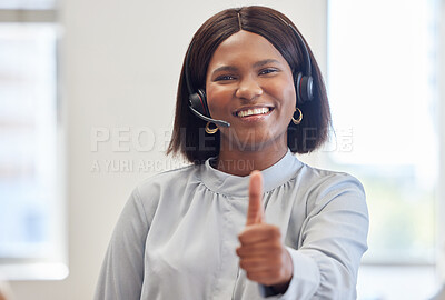 Buy stock photo Shot of an attractive customer service agent standing in the office and showing a thumbs up