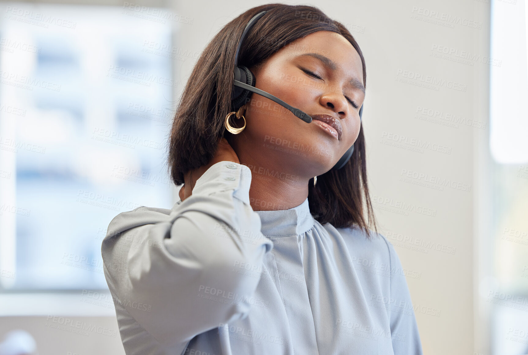 Buy stock photo Woman, call center and neck pain for injury in office, tired and stress at telemarketing job. African person, bad posture and consultant with burnout, accident or fibromyalgia customer care with voip