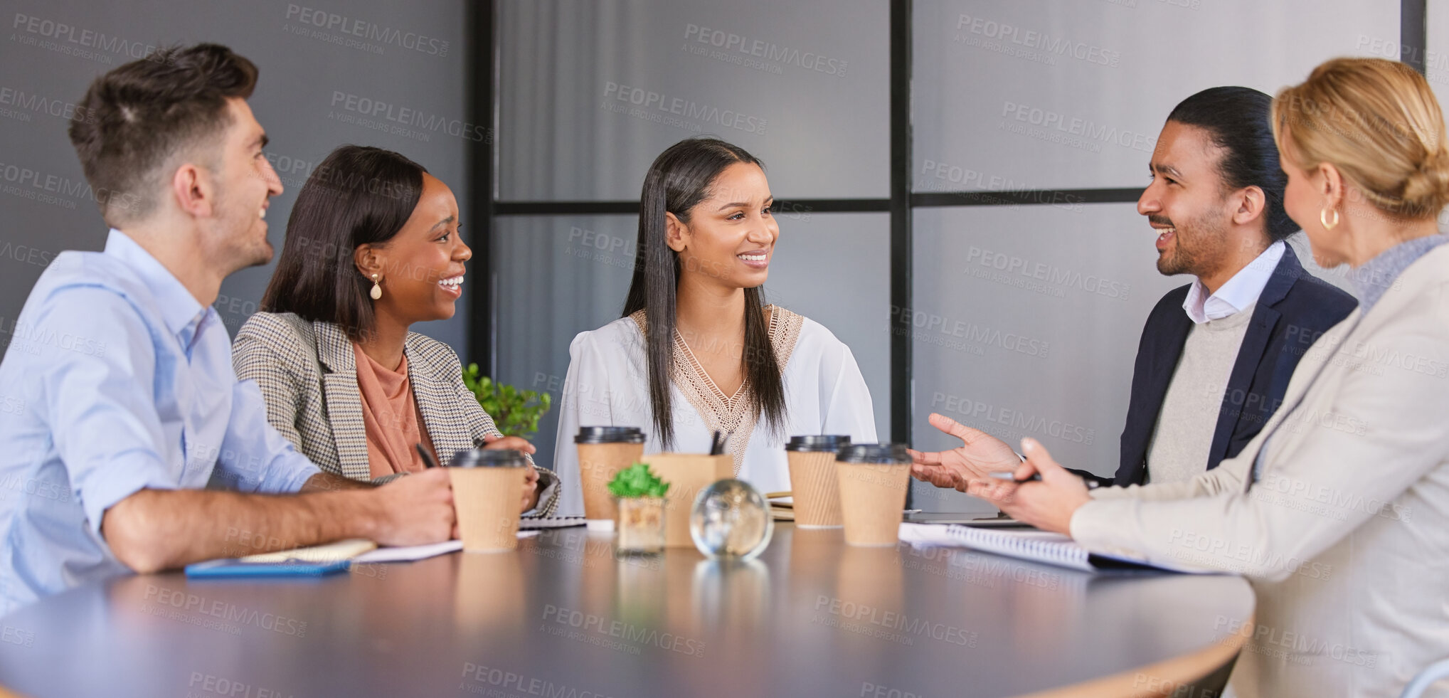 Buy stock photo Shot of a group of businesspeople having a meeting in an office