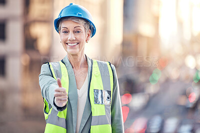Buy stock photo Cropped portrait of an attractive female construction worker giving thumbs up while standing on a building site