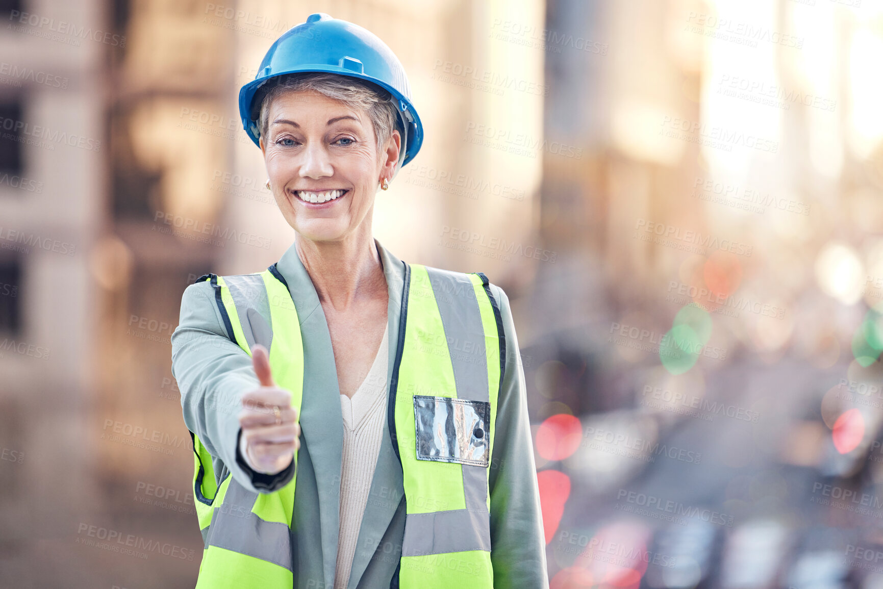 Buy stock photo Construction worker, woman and thumbs up for portrait in city for vote, choice or good service. Mature architect, metro building and like sign for urban expansion, property or real estate development