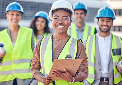 Buy stock photo Engineer, construction and team with black woman or manager outdoor for civil engineering and building. Portrait of leader and gender equality with men and women together for site engineering project