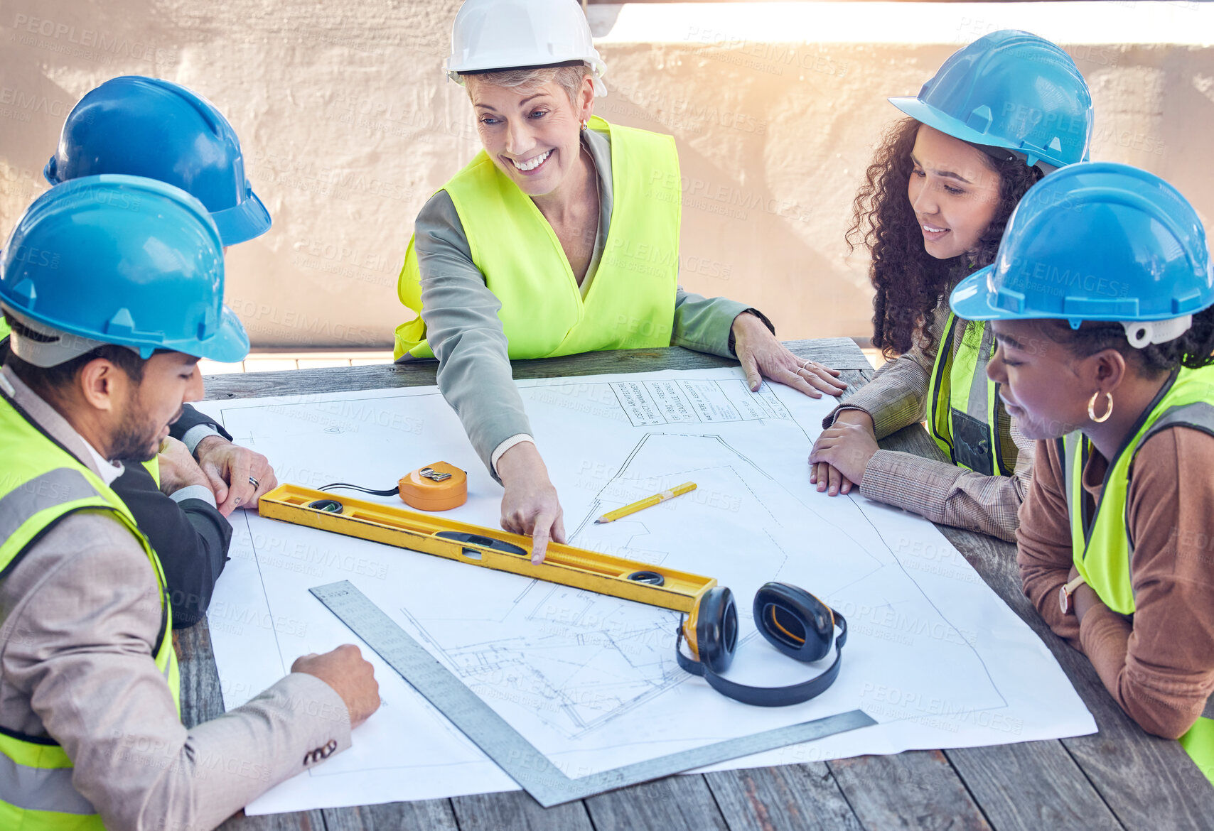 Buy stock photo Architect, engineering and team with blueprint outdoor on table for construction and building project. Manager for gender equality with men and women talking floor plan discussion, planning and paper