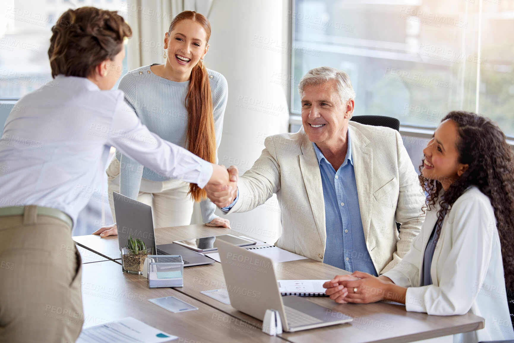 Buy stock photo Happy business people, handshake and meeting with team for agreement, b2b or deal together at office. Businessman shaking hands with employee for greeting, introduction or partnership at workplace