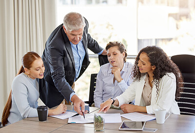 Buy stock photo Shot of a diverse group of businesspeople having a discussion in the office