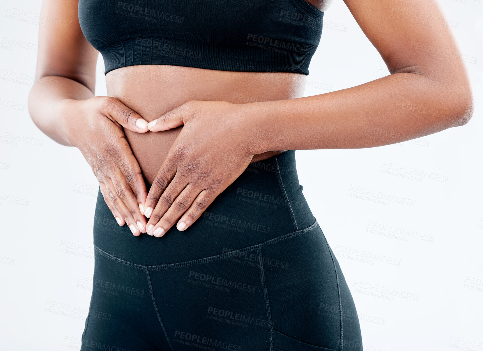 Buy stock photo Woman, hands and stomach health in studio with digestion, progress and detox diet for gut wellness. Female person, abdomen and body goal, weight loss and nutrition balance on white background