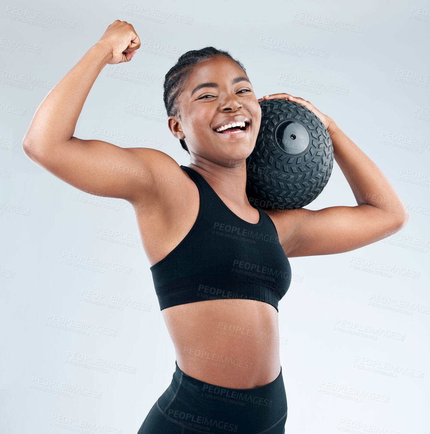 Buy stock photo Fitness, portrait and black woman with medicine ball, smile and strong arm in studio for body wellness on white background. Bicep, flex and face of sports girl model with weightlifting results,