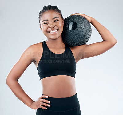 Buy stock photo Portrait, black woman and medicine ball for health, fitness and exercise in white background with happiness. Female person, African and excited for workout, training or cardio as athlete in studio