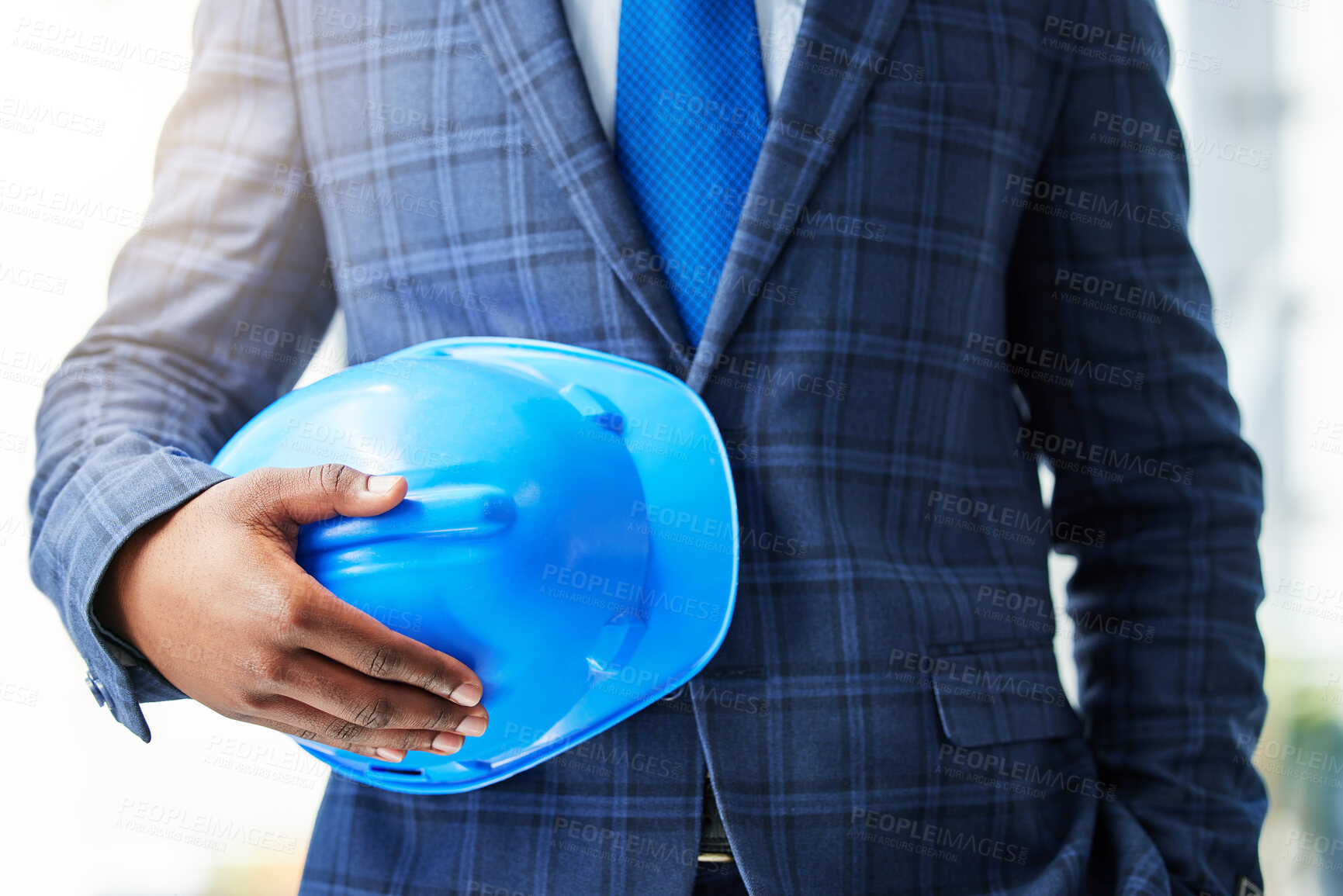 Buy stock photo Business, man and helmet in hands with construction for property development, renovation and maintenance. Architecture, contractor and person at site for supervision, safety or real estate management