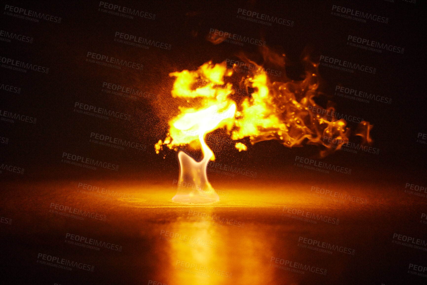 Buy stock photo Studio shot of a small flame burning against a black background