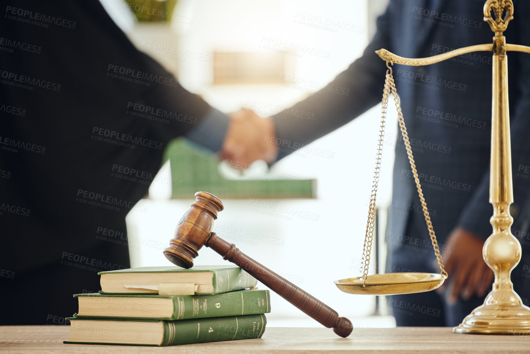 Buy stock photo Gavel, handshake and scale with judge meeting lawyer in chambers for agreement, deal or welcome. Books, law and thank you with attorney people shaking hands for court case or trial settlement