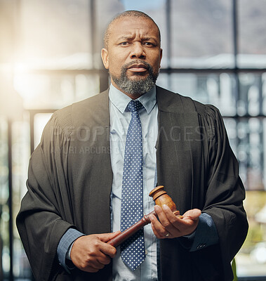 Buy stock photo Portrait, judge and black man with hammer for justice, law or sentence in courtroom. Face, serious lawyer or gavel for legal system with tool for crime punishment or decision of civil rights attorney