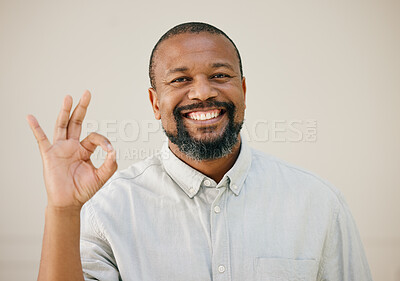 Buy stock photo Portrait, happy and black man with ok sign in studio background for thank you, winner support and agreement.  Smile, male person and hand gesture for yes icon, vote opinion and announcement feedback