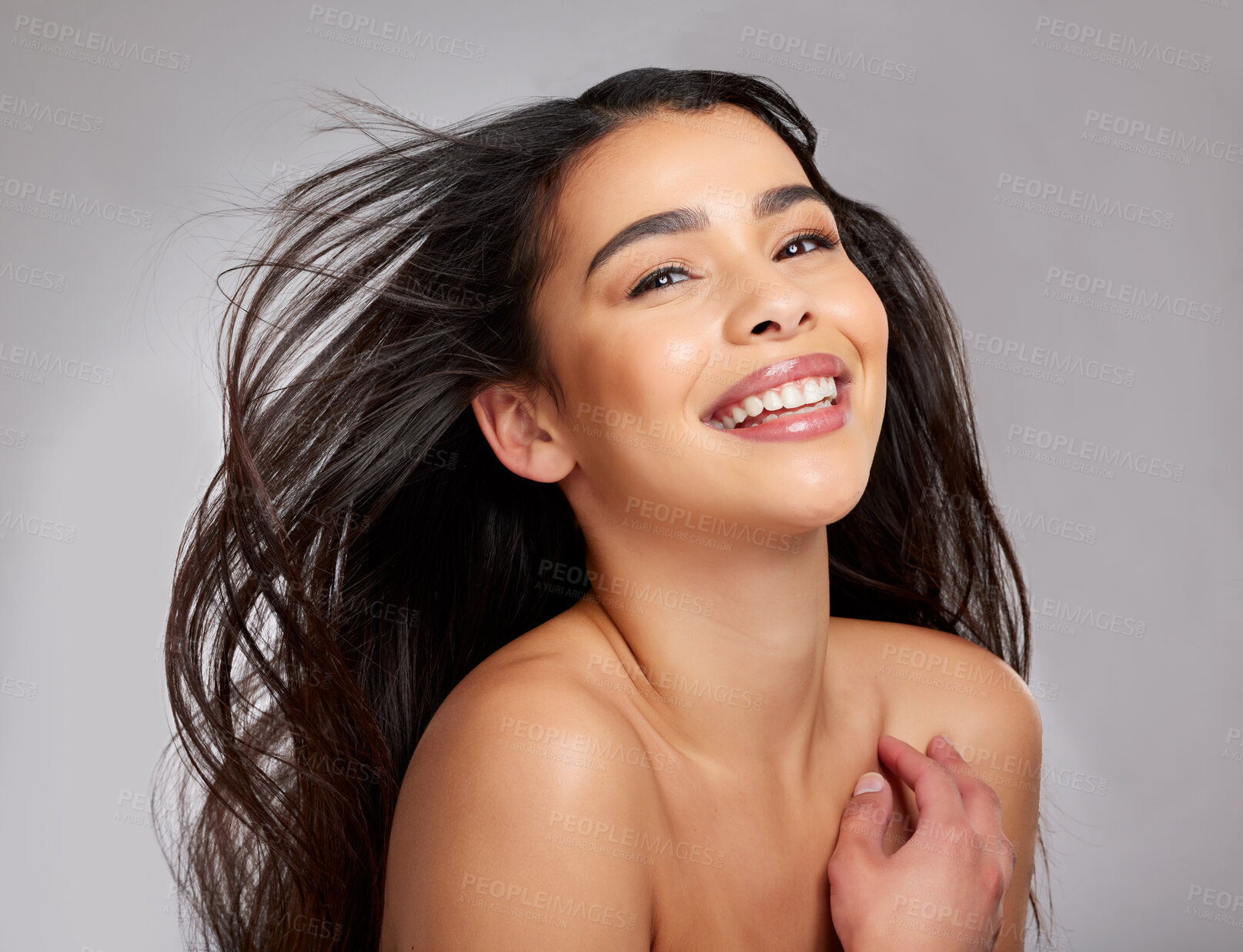 Buy stock photo Portrait, woman and happy haircare in studio for growth, healthy shine and treatment transformation results. Smile, female person and beauty or straight hairstyle, keratin glow and grey background


