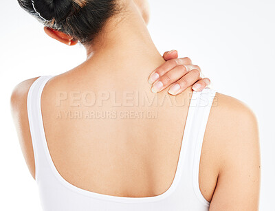 Buy stock photo Workout, neck pain and woman in studio with injury, muscle inflammation or tension on white background. Back view, health emergency and model with spine problem for sprain, discomfort or wellness