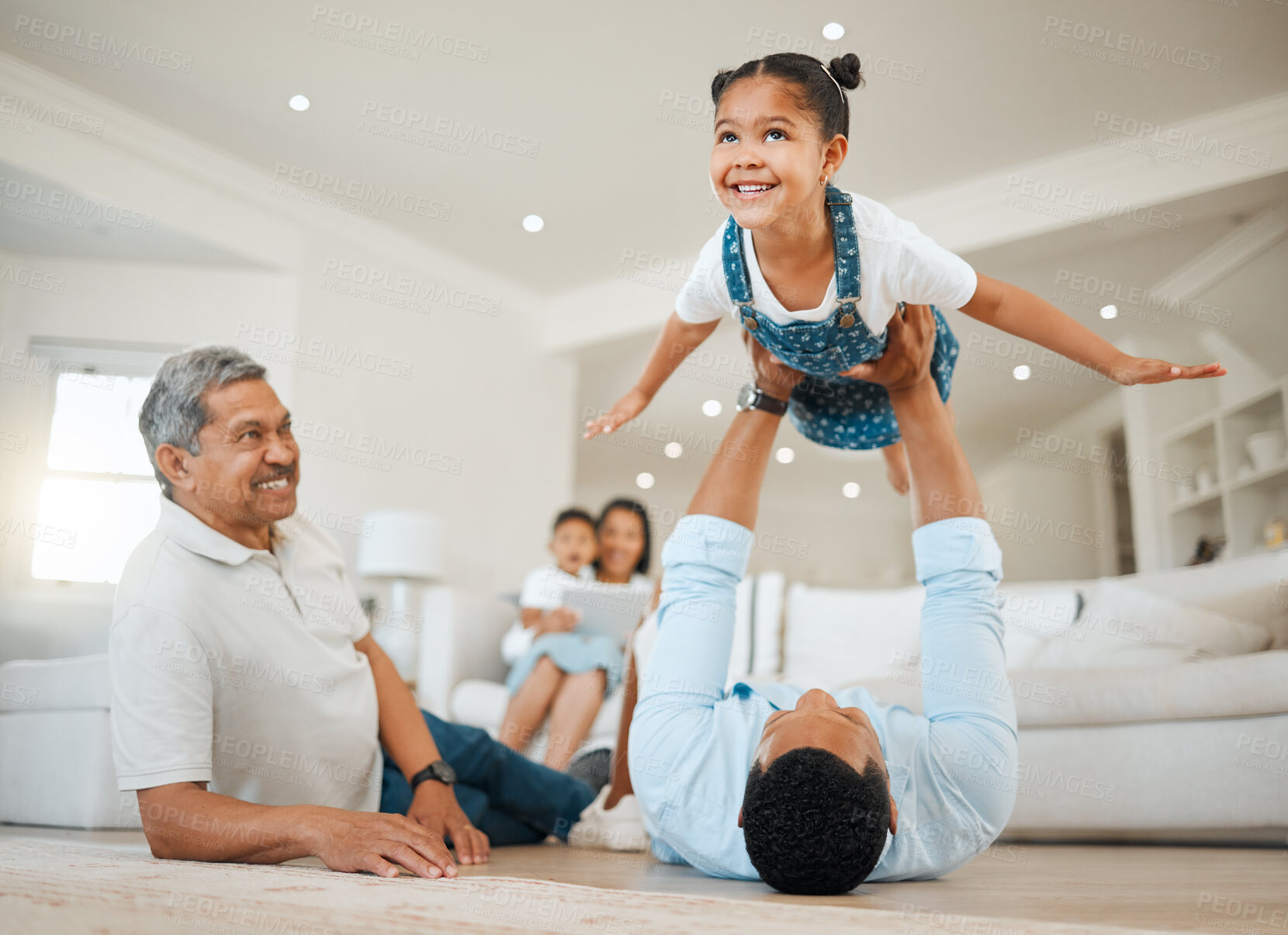 Buy stock photo Happy family, father and playing with daughter in air for aeroplane, flying or playful bonding together at home. Child, little girl or kid with playful dad or smile for fun childhood, love or support