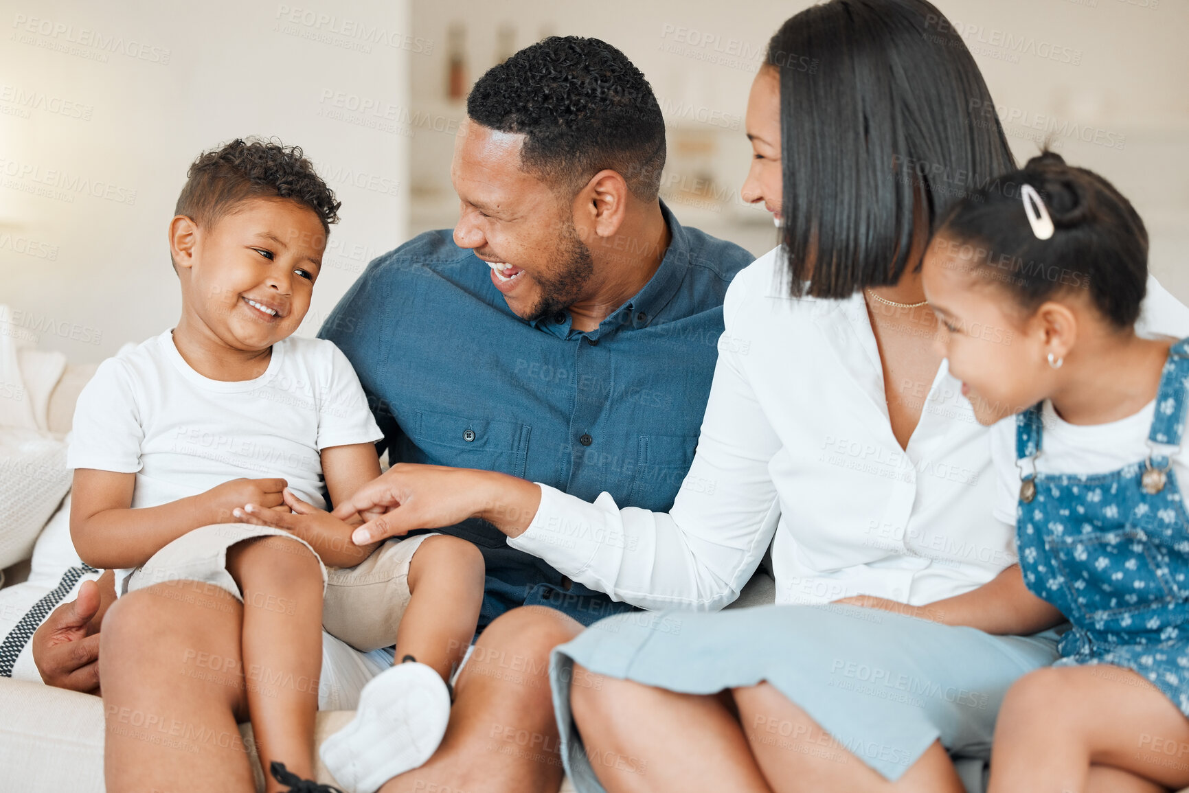 Buy stock photo Happy family, playing and laughing with children on sofa for fun holiday, weekend or bonding at home. Mother, father and playful kids or siblings with smile in joy for youth or childhood at house