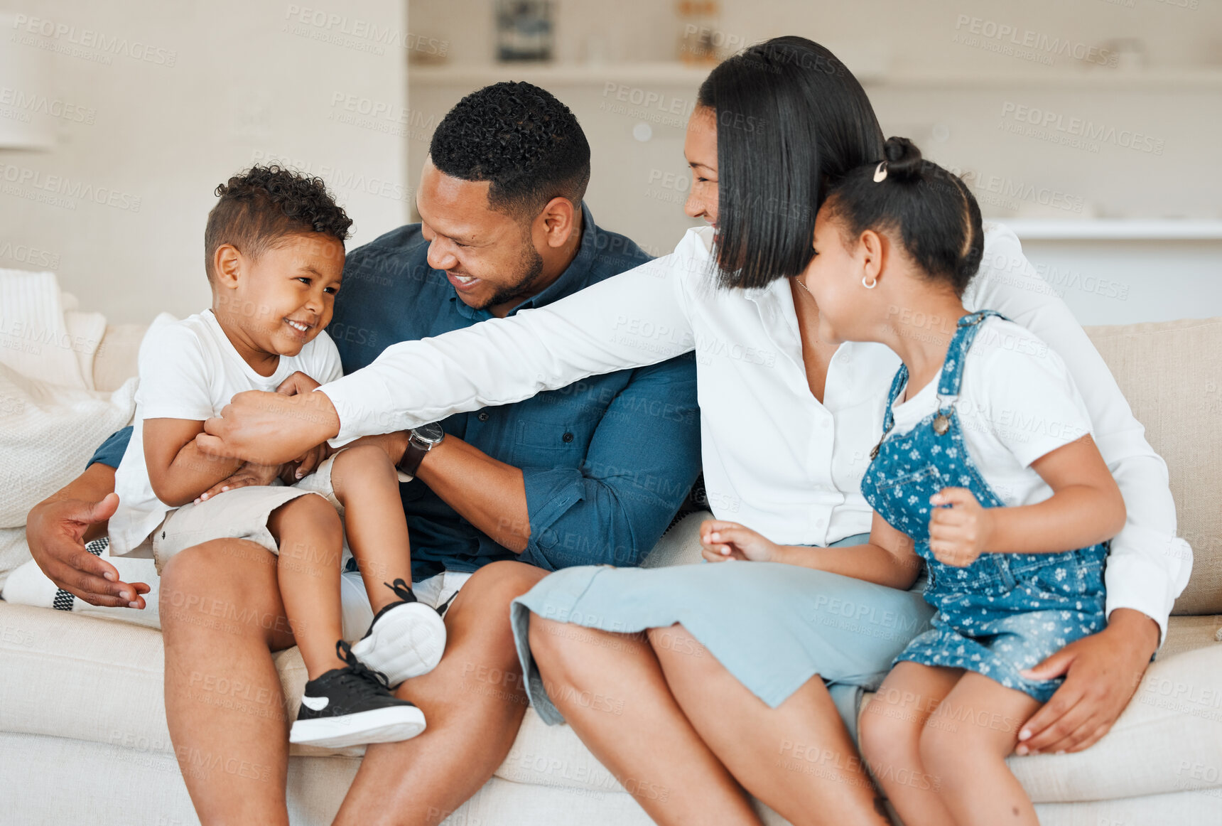 Buy stock photo Happy family, laughing and bonding with playful children on sofa for fun holiday, weekend or love at home. Mother, father and playing with kids, siblings and smile for youth or childhood at house