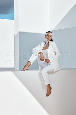 Buy stock photo Shot of a beautiful young woman wearing creative make-up and stylish white clothes