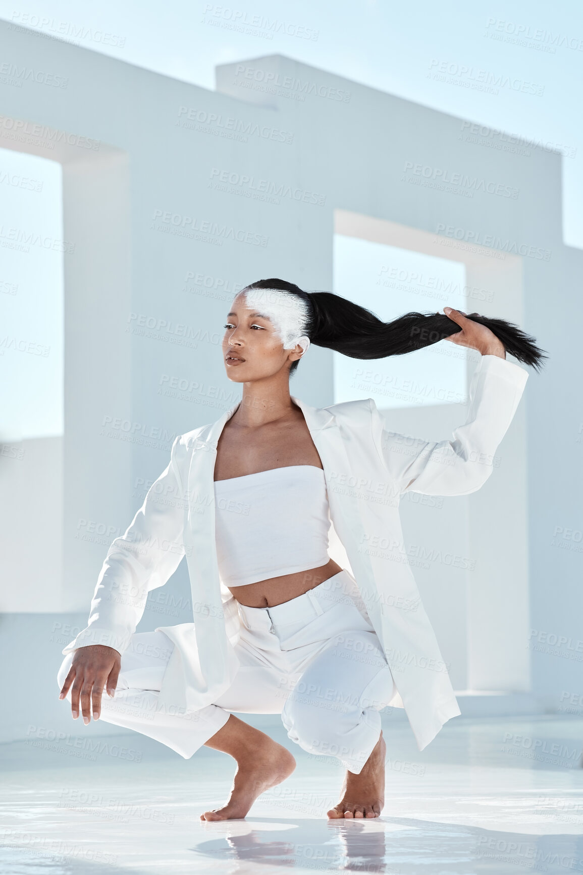 Buy stock photo Shot of a beautiful young woman wearing creative make-up and stylish white clothes