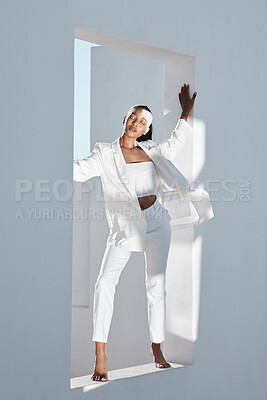 Buy stock photo Shot of a beautiful young woman wearing creative make-up and stylish white clothes