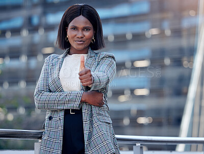 Buy stock photo Portrait, thumbs up and black woman in city for business, agreement and success outdoor. Face, like hand gesture and African female professional with emoji for winner, goals and thank you for vote.