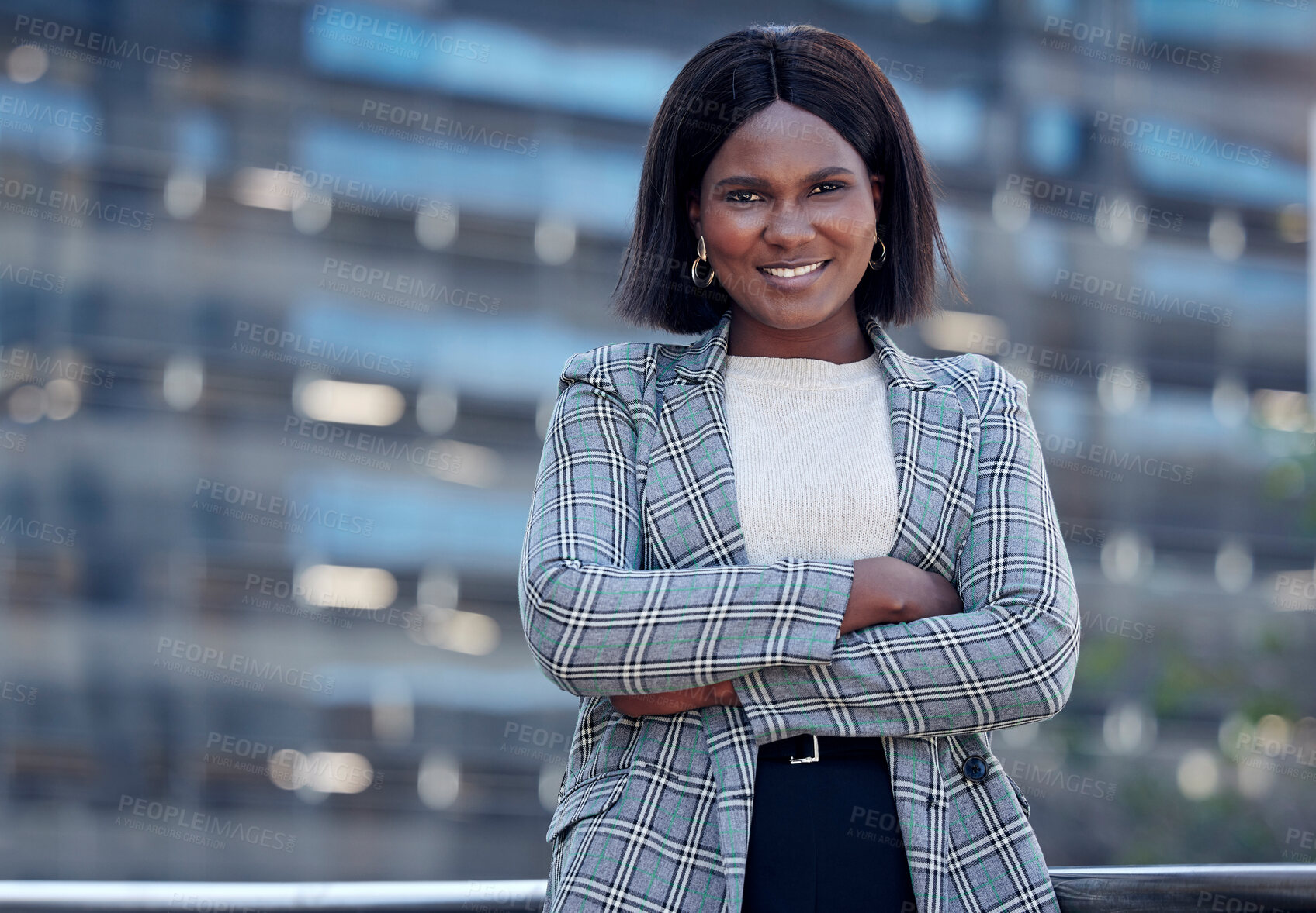 Buy stock photo Attorney portrait, black woman and arms crossed in city for business, career or job. Face, smile and female professional, entrepreneur and lawyer from South Africa with confidence and success mindset