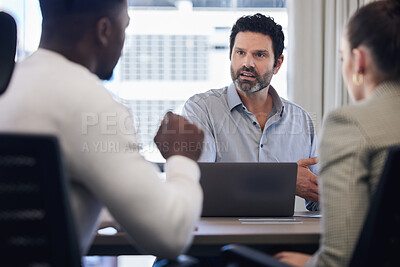 Buy stock photo Meeting, management and a serious man in business talking to staff in his office at work for planning. Laptop, discipline and discussion with a male manager addressing a team in a corporate workplace