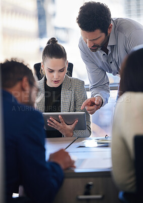 Buy stock photo Digital tablet, collaboration and team doing research together in a meeting in the office. Technology, professional and business people working on a corporate project in the workplace boardroom.