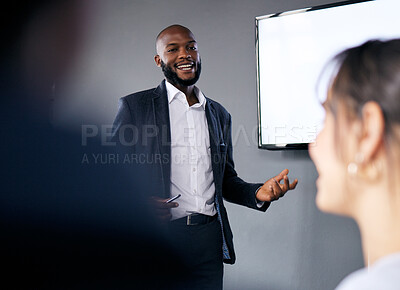 Buy stock photo Meeting, presentation and training with a business black man in the boardroom for a coaching seminar. Management, education and planning with a young male speaker in he office during a workshop