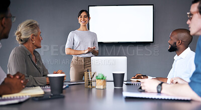 Buy stock photo Business woman, meeting and presentation with mockup screen for team strategy or project management at office. Female person, coach or mentor with smile in staff training on mock up at the workplace